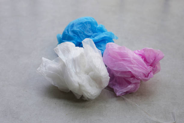 istock Colorful garbage bags on the tiled floor 2199733514