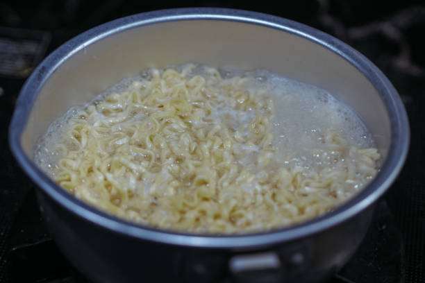 istock instant noodles are being boiled in the pot 2199735869