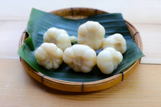 istock Whole fermented garlic, Fermented pickled vegetables 2199738576