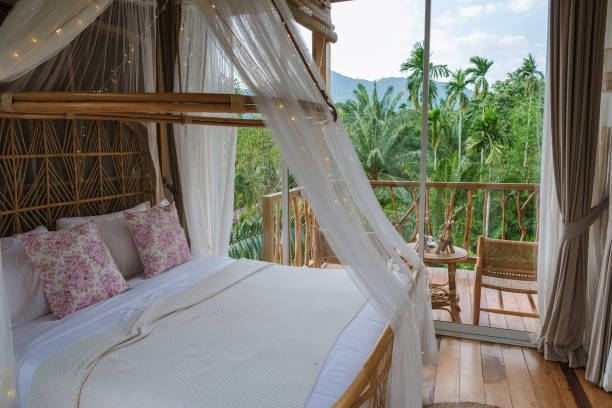 istock Relaxing retreat in a bamboo villa surrounded by lush greenery in Thailand 2199743151