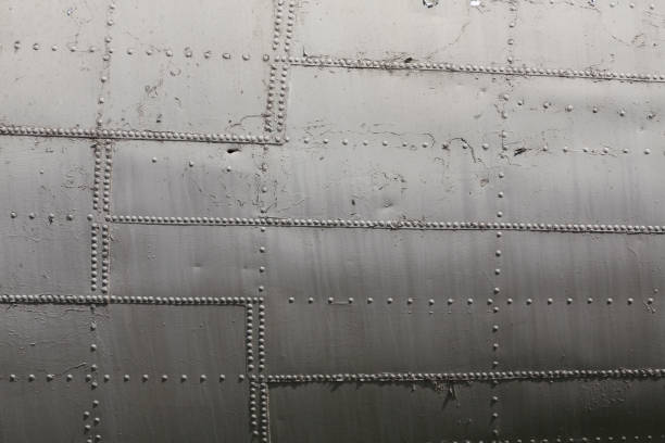 istock old aircraft finish, aluminum riveted skin 2199757215