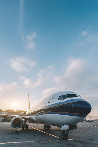istock A Beautiful Sunset with an Airplane on the Tarmac 2199762668