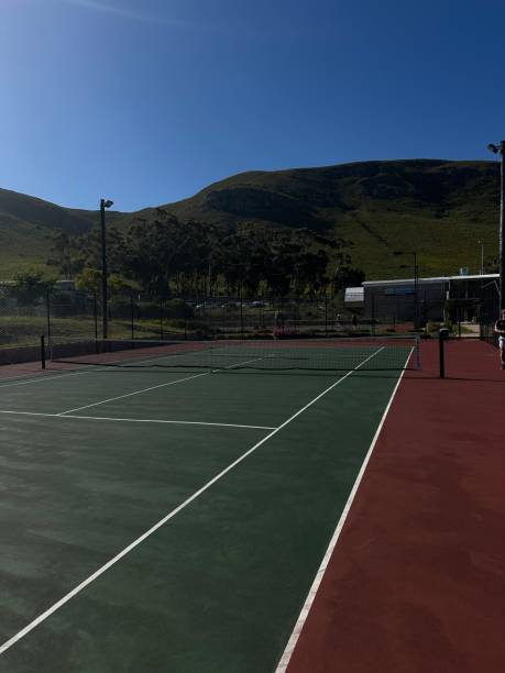 istock Tennis court with mountains 2199763678