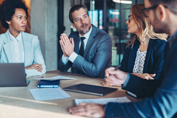 istock Company management having a meeting 2199765341