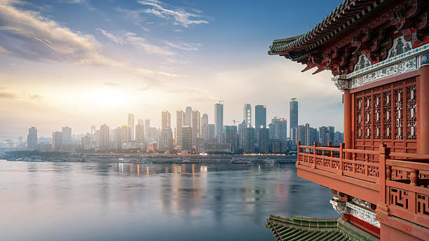istock Stunning Sunset Over Modern City with Traditional Architecture 2199765922