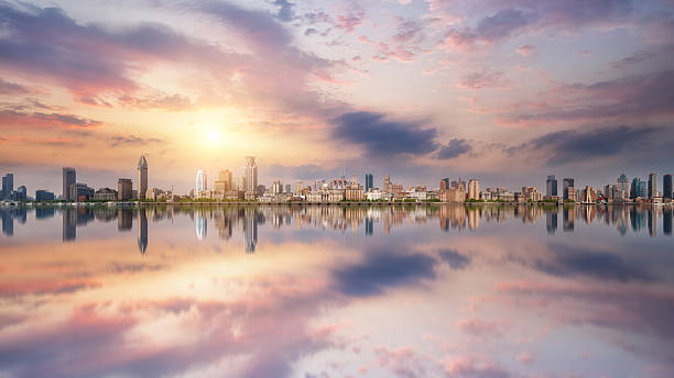 istock Serene Urban Sunset: A Reflection of City Life on Water 2199768039