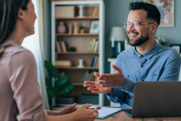 istock Professional Consultation with Enthusiastic Male Advisor 2199768428