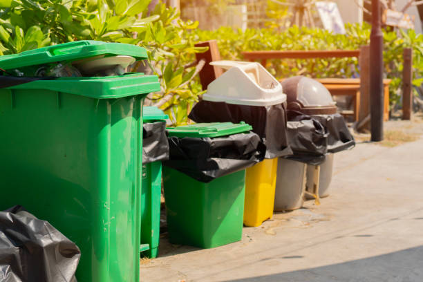 istock Many trash containers for waste sorting by categories for next recycling on the city street. 2199774088