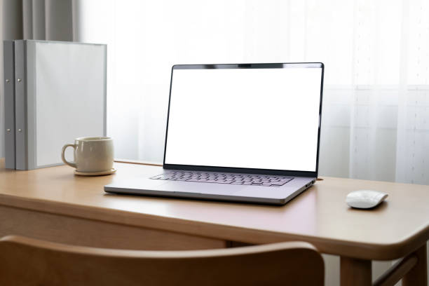 istock Laptop with blank white screen on wooden desk, home office, work from home. 2199776076