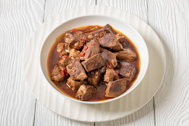 istock beef stew in a white bowl on rustic wooden table 2199782153