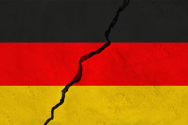 istock German flag on wall with crack. Grunge national flag of Germany. 2199782796