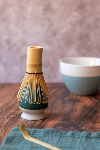 Bamboo whisk, or chasen, in a ceramic holder for preparing Matcha tea