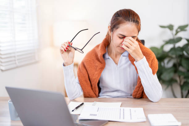istock Tired Business woman working from home 2199784511