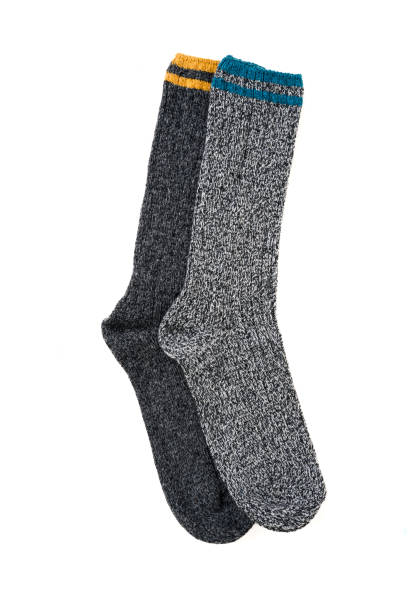 istock Top view of grey woolen winter socks on white background 2199785357