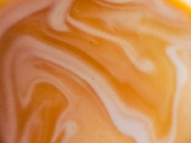 istock coffee and milk mixing abstract or marbled chocolate watercolor ink texture background 2199789595