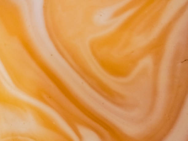 istock coffee and milk mixing abstract or marbled chocolate watercolor ink texture background 2199789617