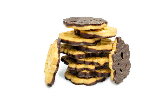 A delicious pile of chocolate crinkle cookies on a pristine white background