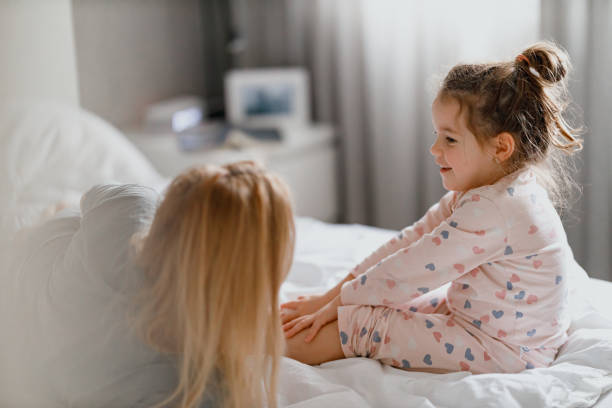 istock Mother and Daughter Morning Bonding 2199799547