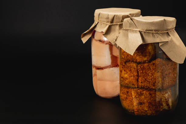 Homemade canned food featuring salted and boiled lard with pickled beans