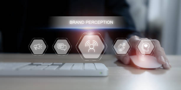 istock Brand perception and digital marketing concept. Using a computer mouse with a futuristic digital interface displaying 