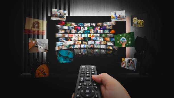 Media concept multiple television screens stock photo