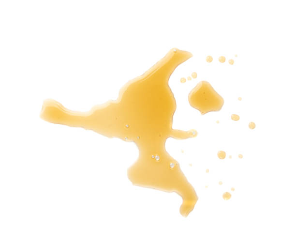 istock Spilled fish sauce isolated, asian fermented liquid puddle, stain, splatter, brown sauce on white 2199807584