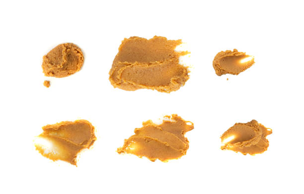 istock Miso paste isolated. Japanese shiro miso seasoning sauce, fermented soybean spread, brown soy cream 2199807612
