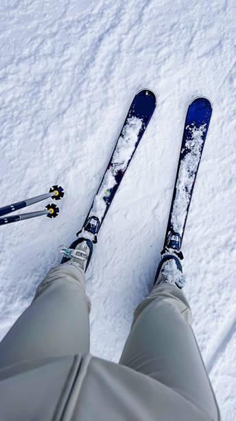 istock Legs in skis on snow, top view 2199811513