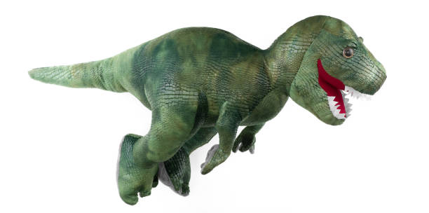 istock plush green dinosaur toy isolated on white background 2199812169