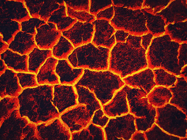 istock Heat red cracked ground texture burning after volcano eruption. Molten active lava texture background. Armageddon natural disaster or hell concept. Earth fissures, break into pieces. Fracture pattern 2199813780