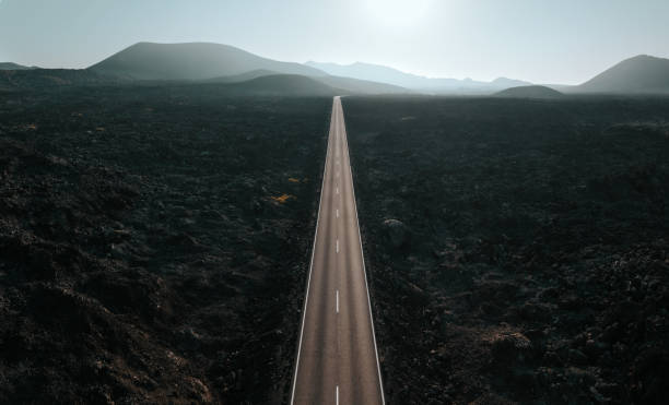 istock Endless Highway Volcanic Landscape Lanzarote Timanfaya National Park 2199816963