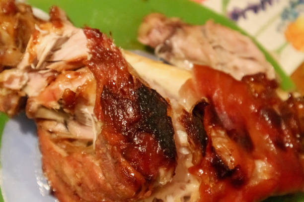 istock .oven-baked pork leg with crispy skin. 2199817456