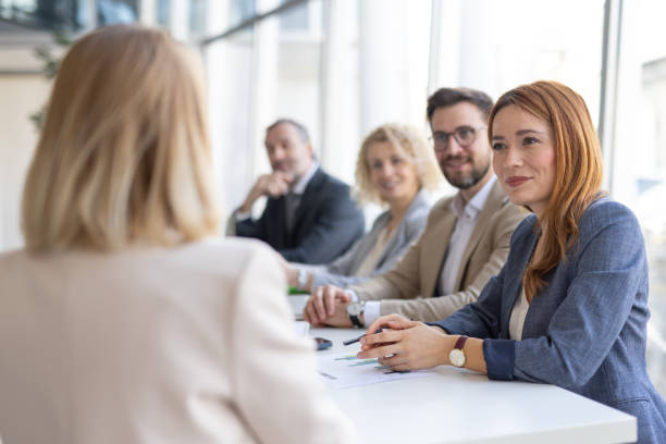 istock Business Meeting with Professional Team Discussing Ideas 2199819633