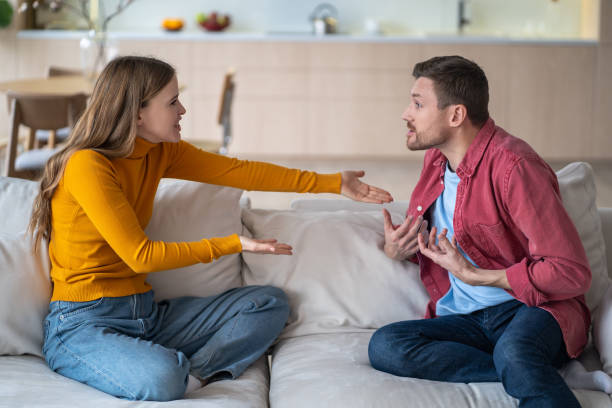 istock Excited man, passionate woman actively arguing, discussing, debating, chatting, communicating. 2199822828