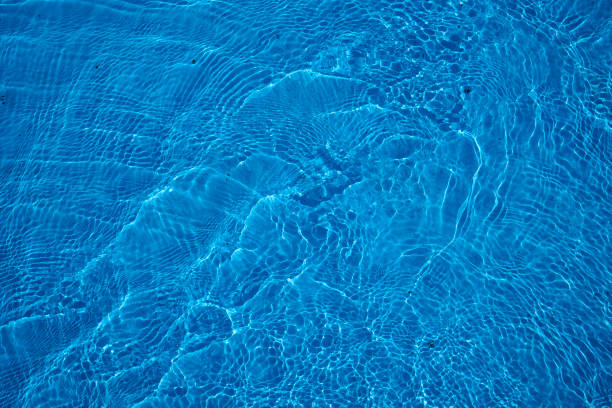 istock Reflecting water wave abstract surface on a sunny day and natural swirl texture 2199827770