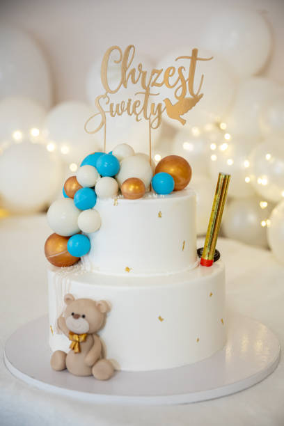 istock An adorable and charming TwoTier Birthday Cake adorned with creative decor and a cute teddy bear 2199831373