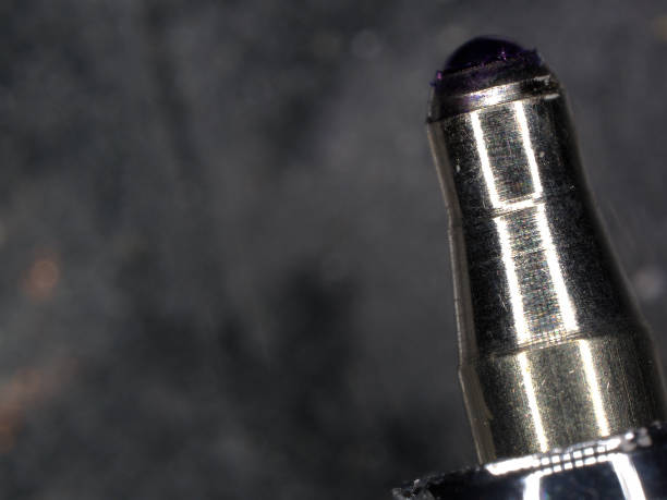 Explore the intricate world of writing instruments through these captivating macro photographs.  From the smooth glide of a ballpoint pen to the bold stroke of a Sharpie, these close-ups reveal the fascinating details of their design and function. Witness the precision engineering and subtle textures that make these everyday tools so essential