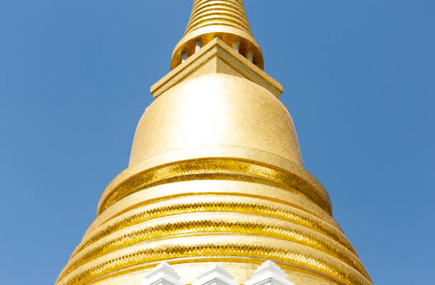 Shot in color detail on the facade of this historic building representing some character, animal or flower. Set at Bangkok, Thailand, Asia