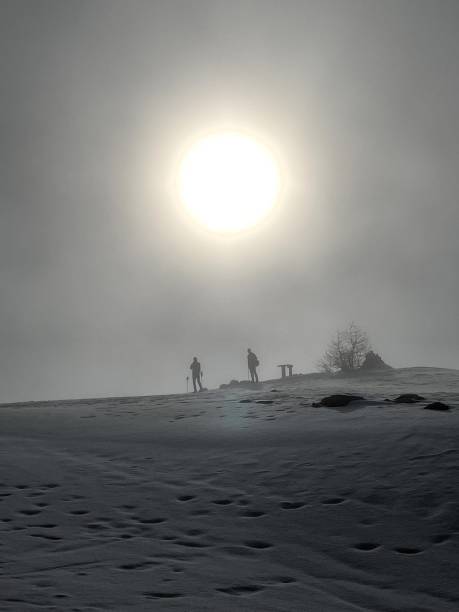 istock Hikers in the fog 2199835712