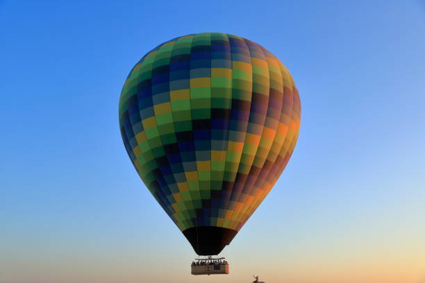 istock A colorful hot balloon view at sunrise. 2199840256