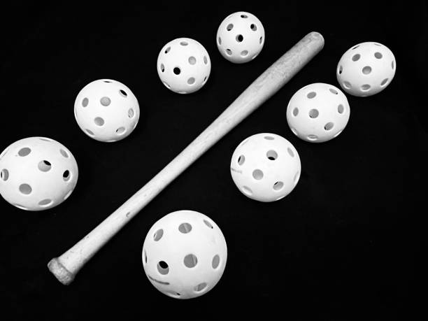 istock Wiffle Balls and Wood Bat 2199856529