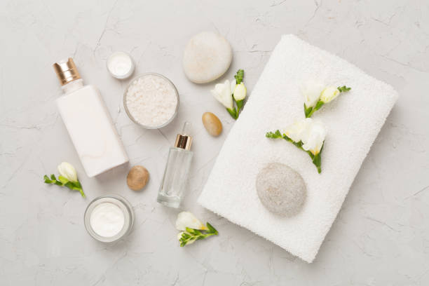 istock Flat lay with spa products and flowers on concrete background 2199863777