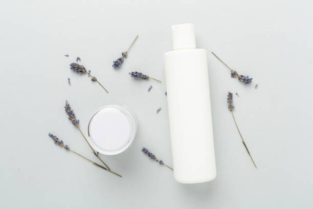 istock Cream with lavender extract on color background,, top view 2199863782