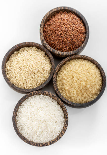 istock different kinds of asian rice grains in bowls on white background 2199864020