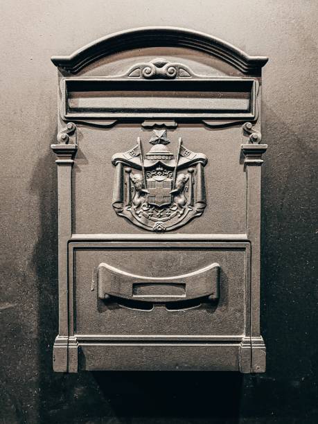 Black neighborhood mailbox with flag
