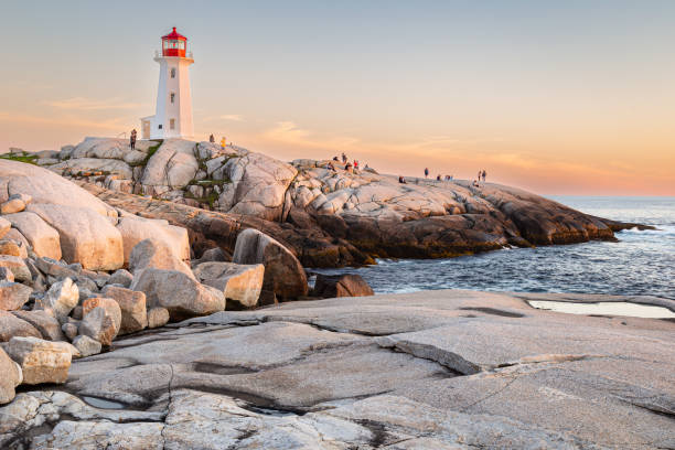 istock Pegg's Cove Lighthouse in Nova Scotia during Sunset 2199876485