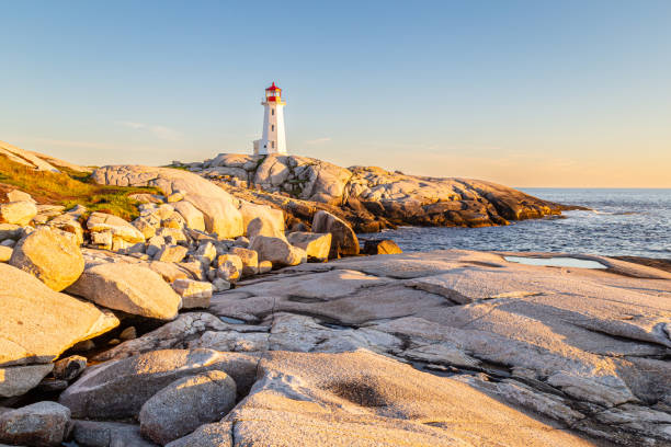 istock Pegg's Cove Lighthouse in Nova Scotia during Sunset 2199876504