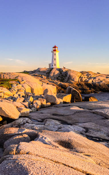 istock Pegg's Cove Lighthouse in Nova Scotia during Sunset 2199876548