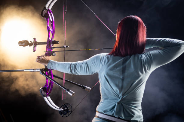 istock Skilled Caucasian Female Archer in Dynamic Studio Shot 2199877164