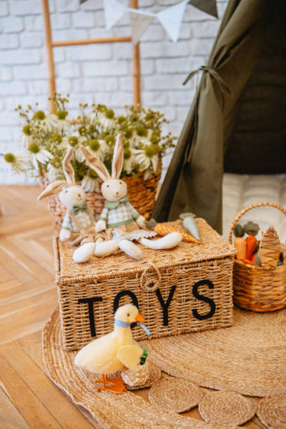 istock Decorative toy storage and plush animals in cozy playroom setting 2199877433
